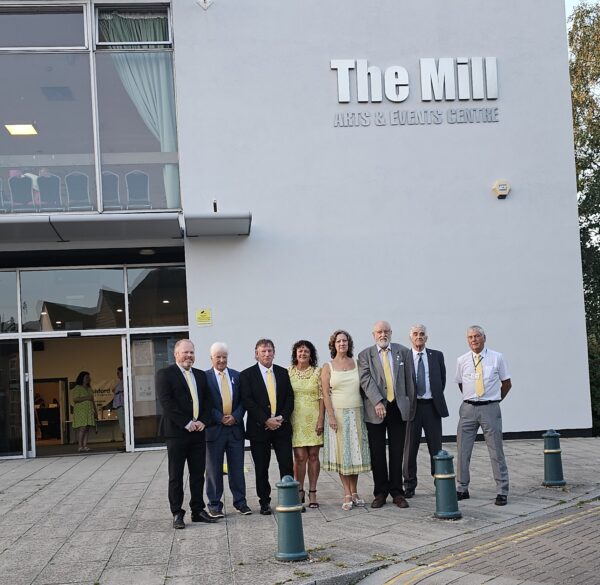 the lib dem team outside of the mill hall arts and events centre